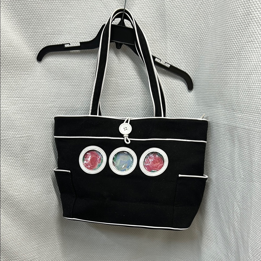 Stylish Black Tote Bag with White Accents photo‎ pockets on front